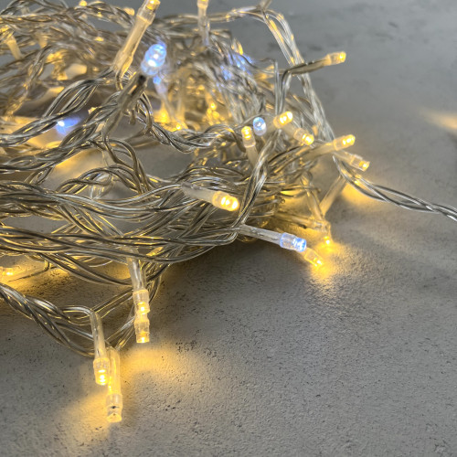 Светодиодная нить 100 теплых белых LED ламп с мерцанием, 10 м., 24В, прозрачный провод ПВХ, LTC (PST100BLW-10-1WW)
