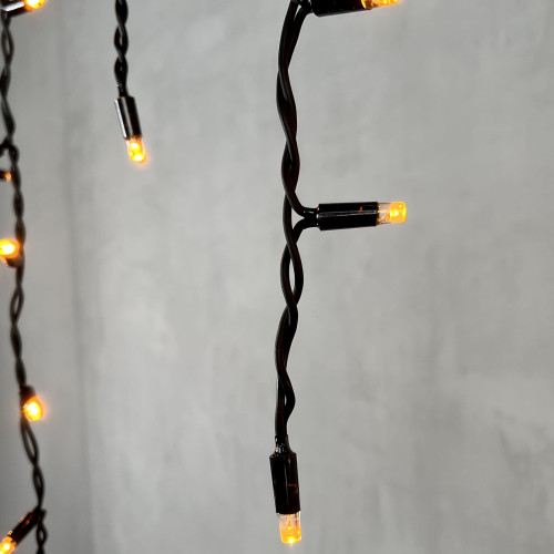 Светодиодная бахрома с колпачком 3,1*0,5 м., 120 желтых LED ламп, каучуковый черный провод, LTC (LL120-1-2Y)