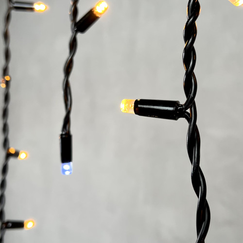 Светодиодная бахрома с колпачком 3,1*0,5 м., 120 экстра теплых белых LED ламп, мерцание, каучуковый черный провод, LTC (LL120BLW-1-2EWW)