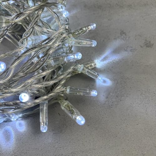 Светодиодная гирлянда с колпачком 100 холодных белых LED ламп 10 м., мерцание, 24В., прозрачный провод ПВХ, IP65, LTC (PST100BLWCAP-10-1W)