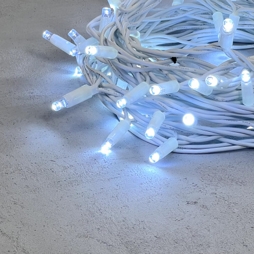 Светодиодная гирлянда с колпачком 75 холодных белых LED ламп 10 м., 24В., белый каучуковый провод, IP65, LTC (LL75-8-1W)