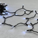 Светодиодная гирлянда с колпачком 100 холодных белых LED ламп 10 м., 220-230 В., черный провод ПВХ, IP65, LTC (PST100CAP-11-2W)