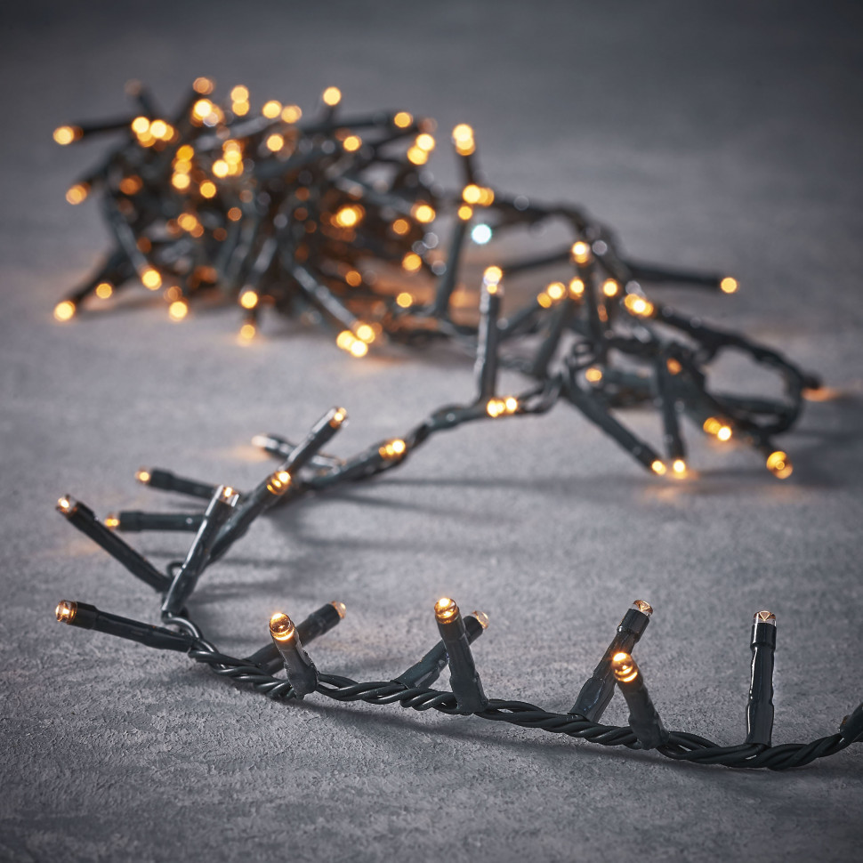 Светодиодная нить Snake Light 700 теплых ламп, 14 м., 24В, 8 режимов, зеленый провод, для елки 215 см., Christmas DeLuxe (83770)
