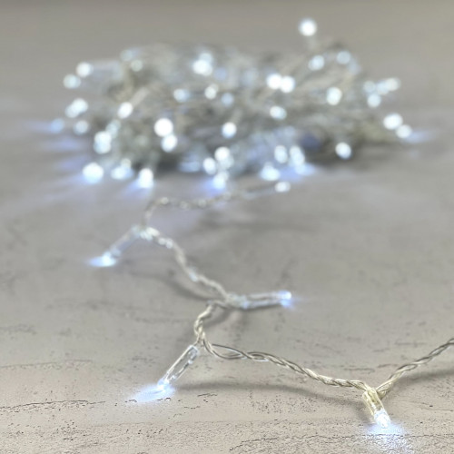 Светодиодная гирлянда с колпачком 100 холодных белых LED ламп 10 м., мерцание, 220-230 В., прозрачный провод ПВХ, IP65, LTC (PST100BLWCAP-10-2W)