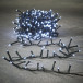 Светодиодная нить Snake Light 550 холодных ламп, 11 м., 24В, 8 режимов, зеленый провод, для елки 185 см., LUCA (83773)