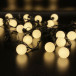 Светодиодная гирлянда шарики 5 м., 20 теплых белых LED, статика, черный резиновый провод, Teamprof (TPF-S5-20C/24V-40B-SRB/WW)